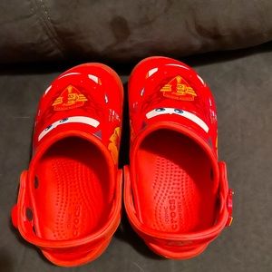 These are toddler size 10c Lightning McQueen crocs.